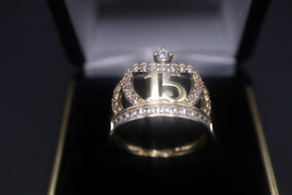 14 K Gold Ring (Quinceanera) crown-shaped ring with CZs all around.  Weight: 4.2 G  Size: 8.5