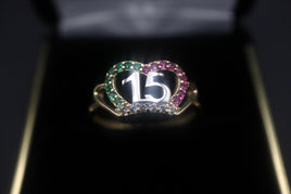 14 K Gold Ring (Quinceanera) colored CZ crown-shaped ring with "15" in the middle.  Weight: 2.0 G  Size: 7.5