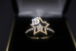 14 K Gold Ring (Quinceanera) ring with a CZ star in the middle and "15" at the top.  Weight: 1.8 G  Size: 6.5