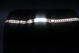 14 K Gold Bracelet Quenceneara bracelet with "15" on the plate.