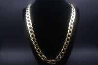 14 K Gold Chain 26" Cuban link-style chain. 53.5 G