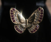 14 K Gold Ring A butterfly-shaped ring with ruby stones 3.6 G