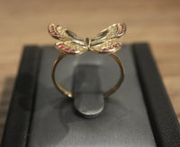 14 K Gold Ring A butterfly-shaped ring with ruby stones 3.6 G