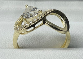14 K Gold Ring CZ infinity-shaped ring with a heart CZ stone on the side.  Weight: 2.5 G  Size: 7