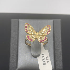 14 K Gold Ring A butterfly-shaped ring with red ruby stones 3.6 G